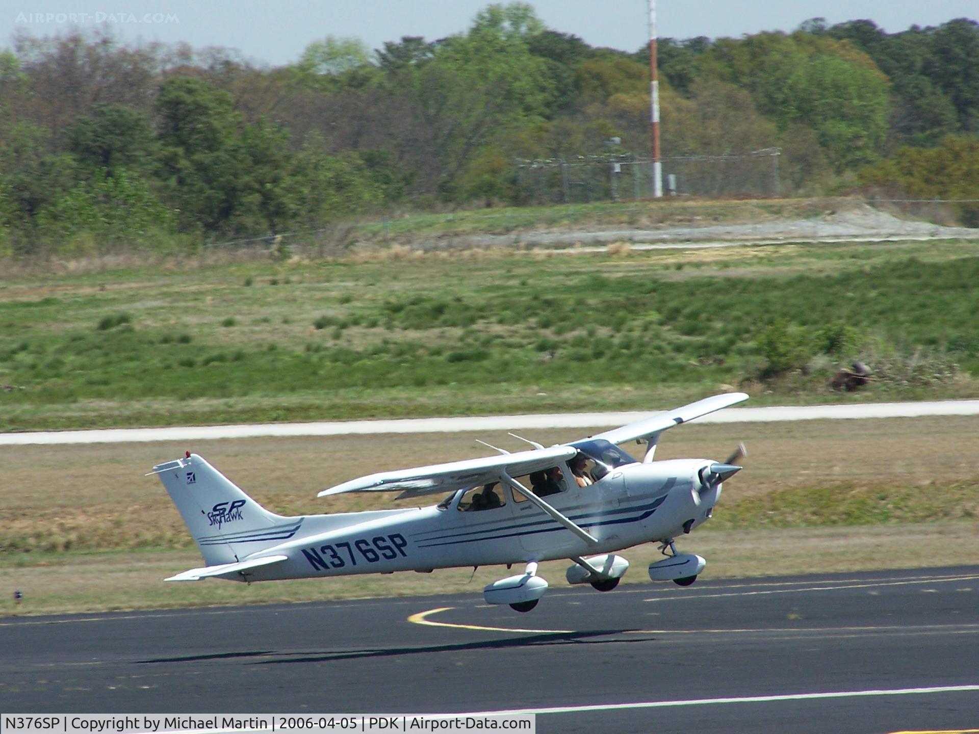N376SP, 2003 Cessna 172S Skyhawk SP C/N 172S9508, Catching a little cross-wind on landing!