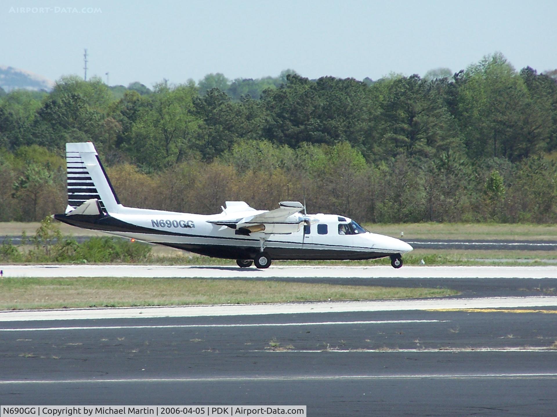N690GG, 1977 Rockwell International 690B C/N 11411, Landing PDK headed to Mercury Air Center