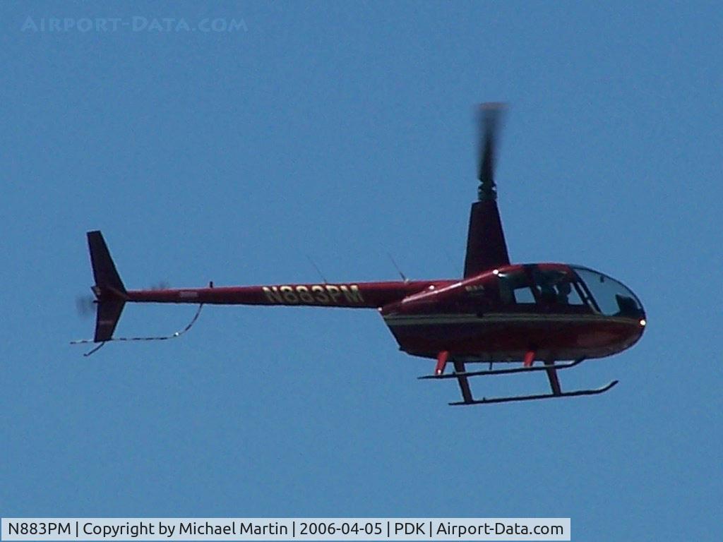 N883PM, 2001 Robinson R44 C/N 1091, Over flying PDK