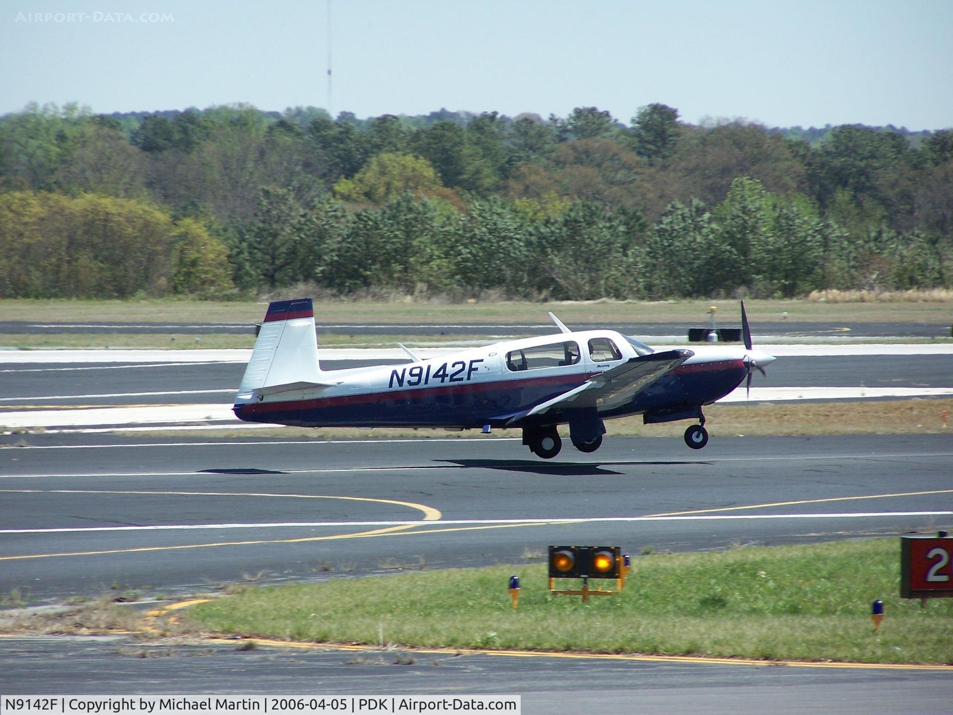 N9142F, 1991 Mooney M20M Bravo C/N 27-0087, Landing PDK on 20R