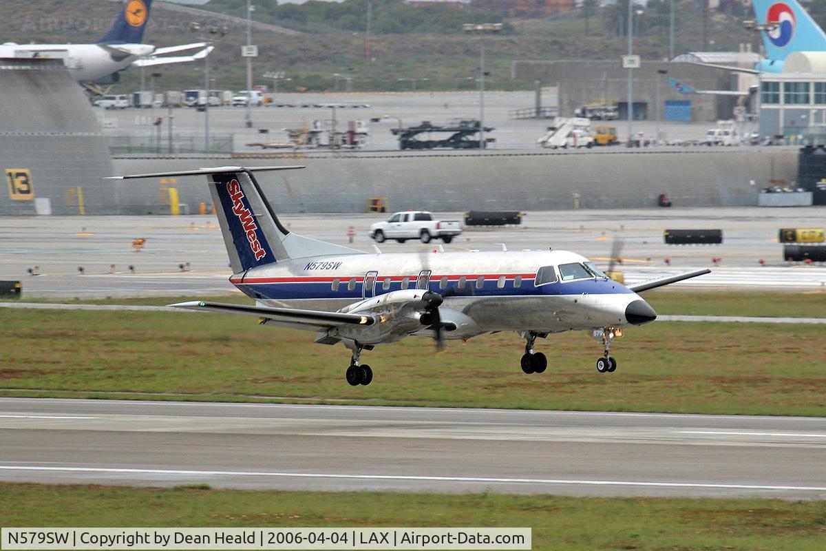 N579SW, 1998 Embraer EMB-120ER Brasilia C/N 120347, Skywest (FLT 6128) Embraer EMB-120 Brasilia arriving RWY 7R from Ontario Int'l (KONT), California.