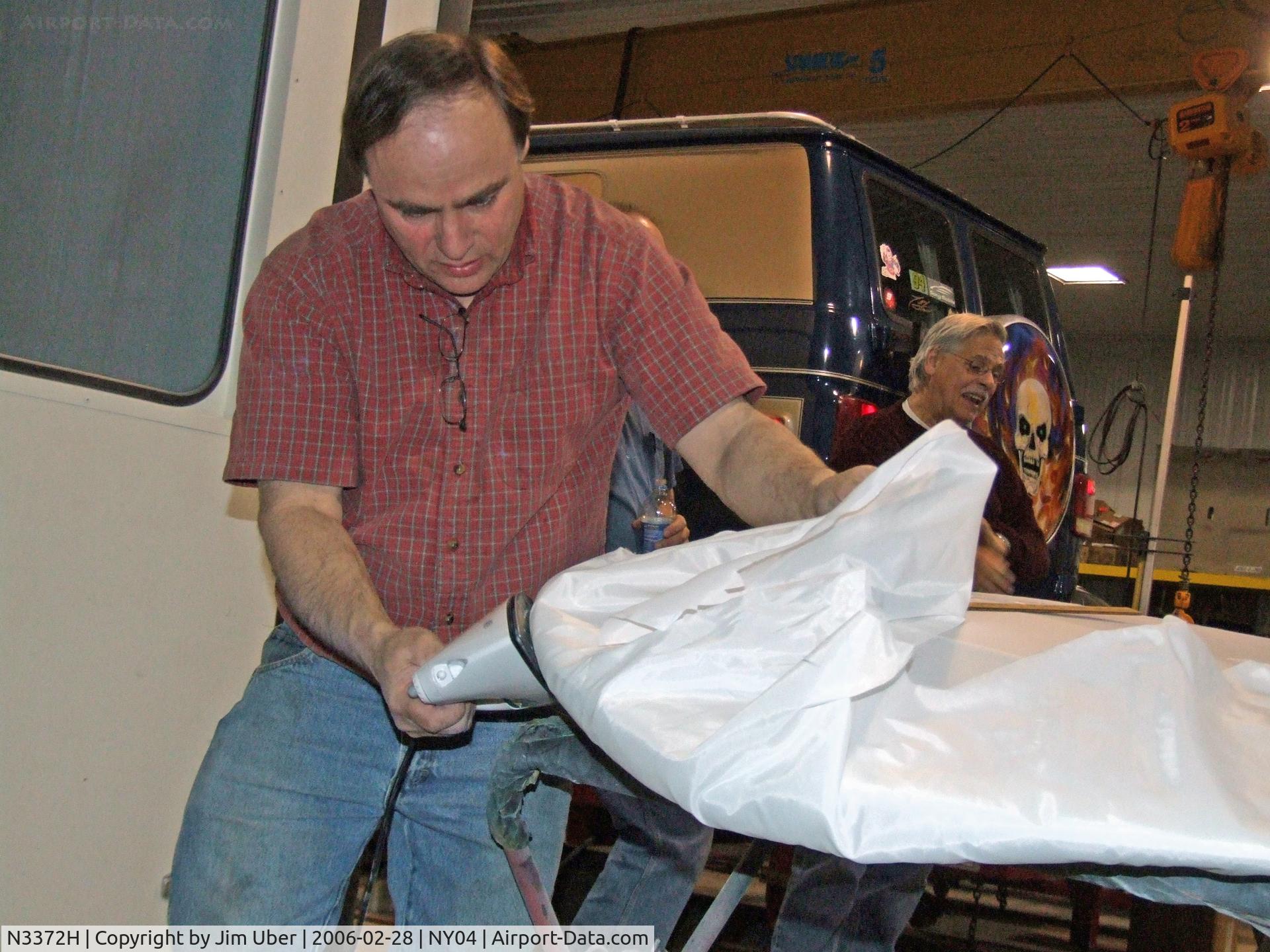 N3372H, 1946 Erco 415C Ercoupe C/N 3997, Bill applies fresh Ceconite to the wings