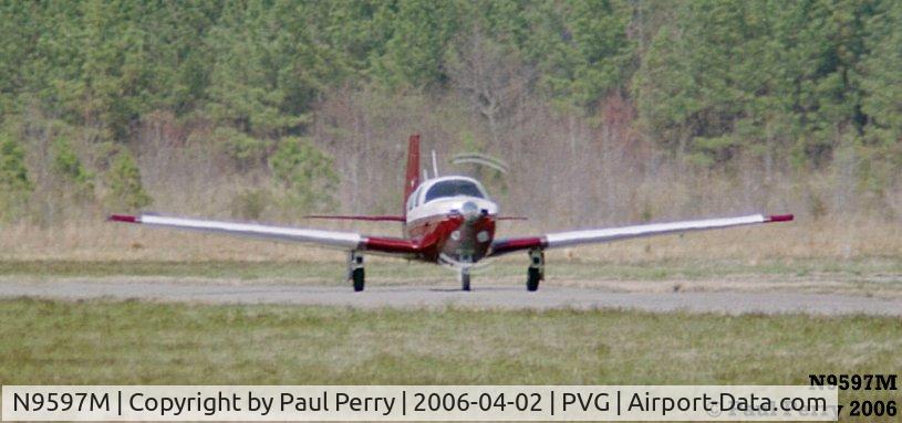 N9597M, 1966 Mooney M20F Executive C/N 670174, Taxiing to the end of the runway for her spot in the takeoff order