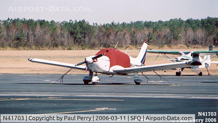 N41703, 1974 Piper PA-28-180 C/N 28-7405134, Another transient still tied down and tucked in, in the midmorning