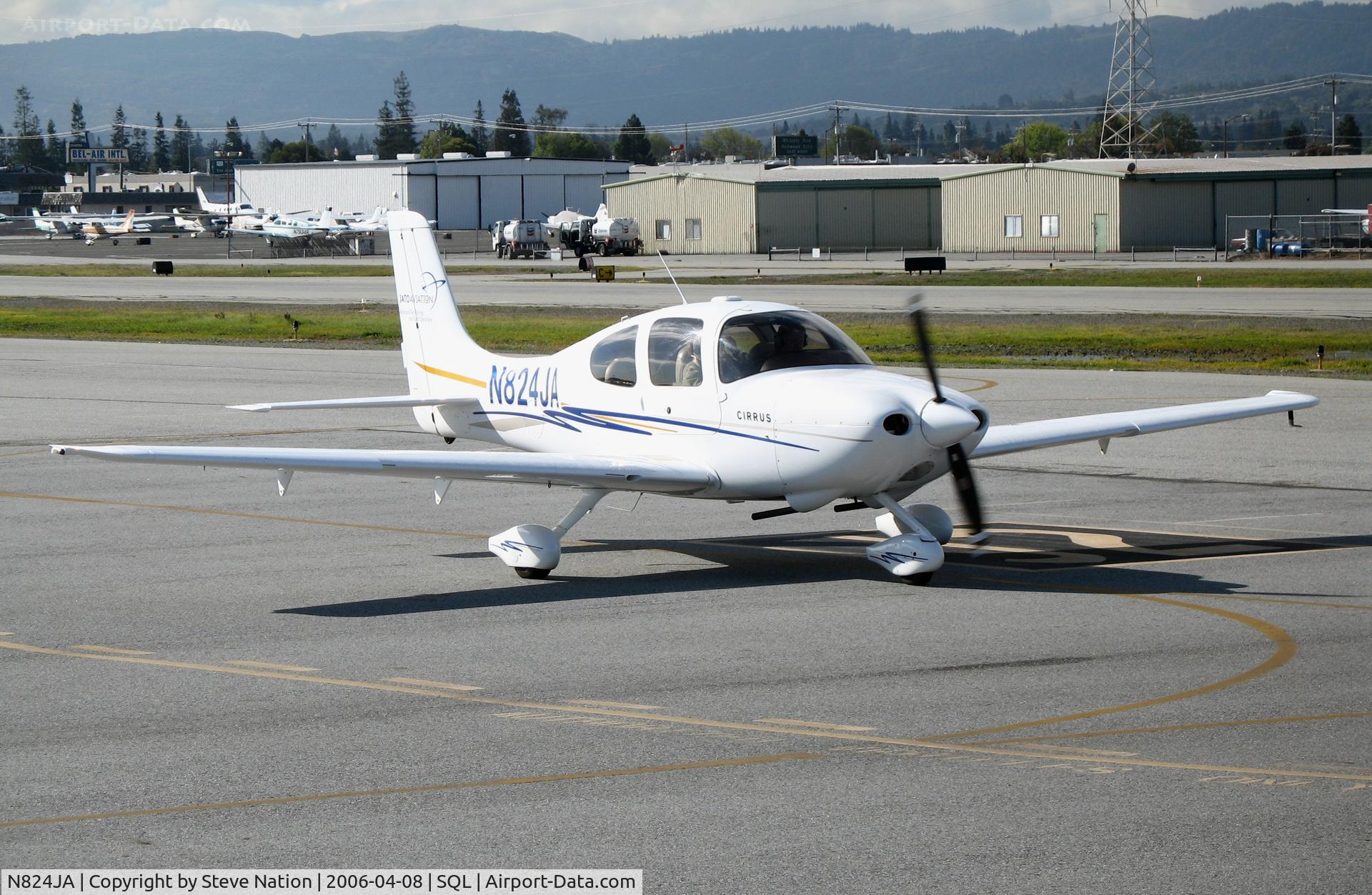 N824JA, 2004 Cirrus SR20 G2 C/N 1444, JATO Aviation 2004 Cirrus Design SR22 doing final checklist @ San Carlos Airport, CA in rare spring 2006 sunshine