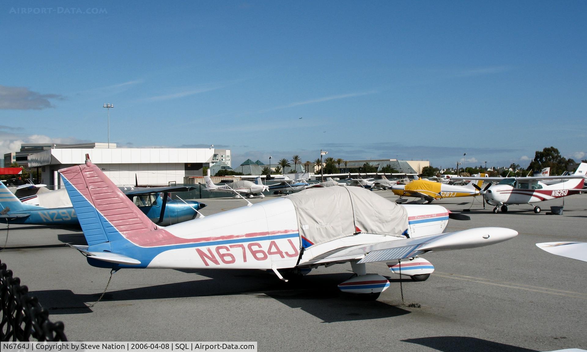 N6764J, 1968 Piper PA-28-140 C/N 28-24488, 1968 Piper PA-28-140 under wraps @ San Carlos Airport, CA in rare spring 2006 sunshine