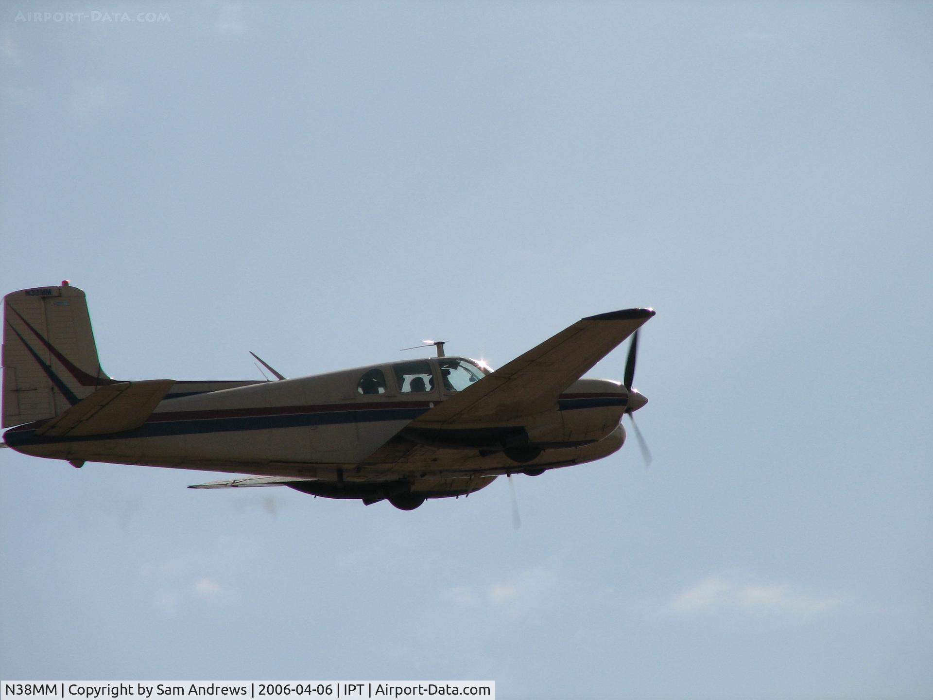 N38MM, 1955 Beech C-50 Twin Bonanza C/N CH-297, Just missed a good shot of this one.  Photog error