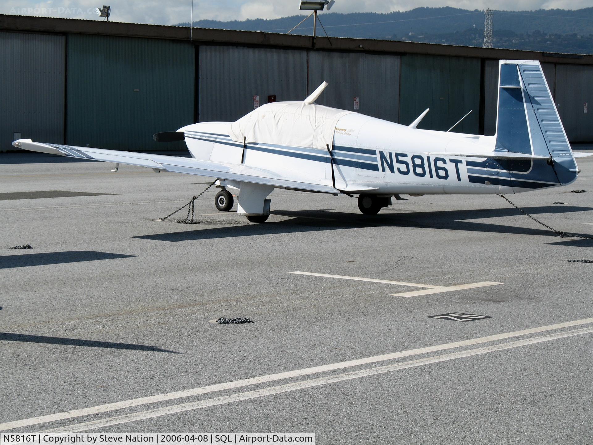N5816T, 1985 Mooney M20J 201 C/N 24-1569, 1985 Mooney M20J under wraps @ San Carlos Airport, CA in rare spring 2006 sunshine