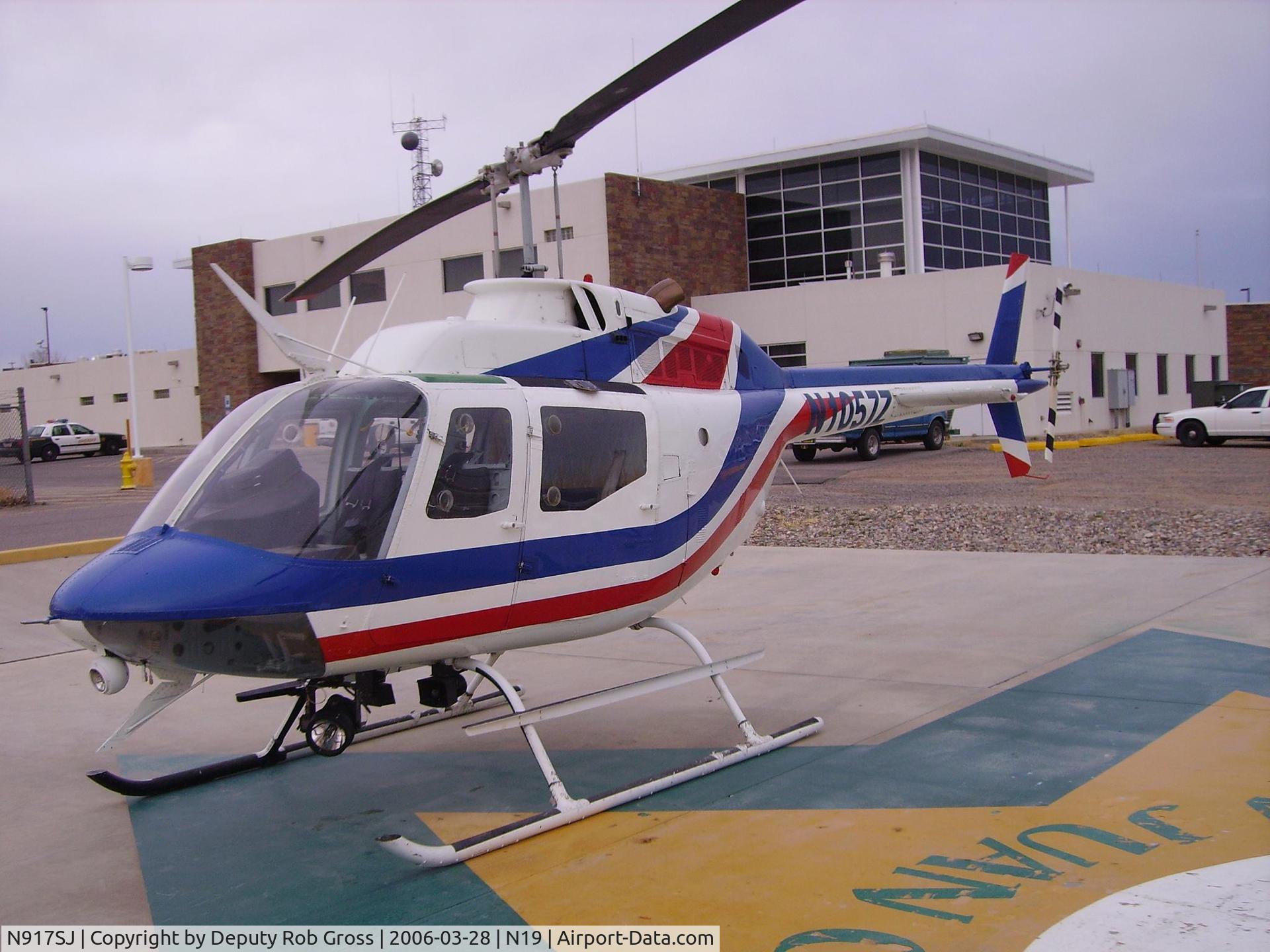 N917SJ, Bell OH-58A C/N 72-21210, N917SJ (still displaying N1057Z) on SJCSO helipad