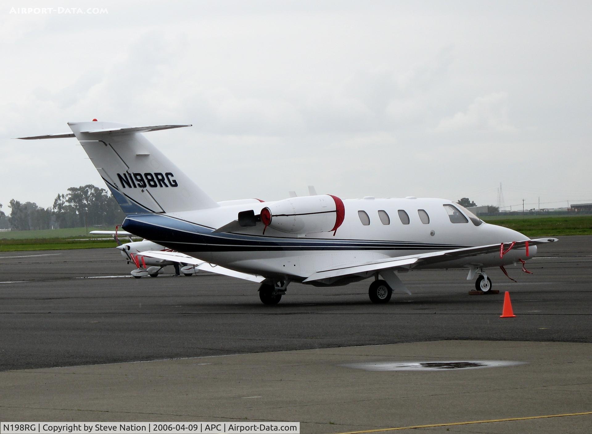 N198RG, 1997 Cessna 525 CitationJet C/N 525-0198, RJ Grad Aviation 1997 Cessna 525 Citation @ rainy Bridgeford A/S ramp Napa County Airport, CA