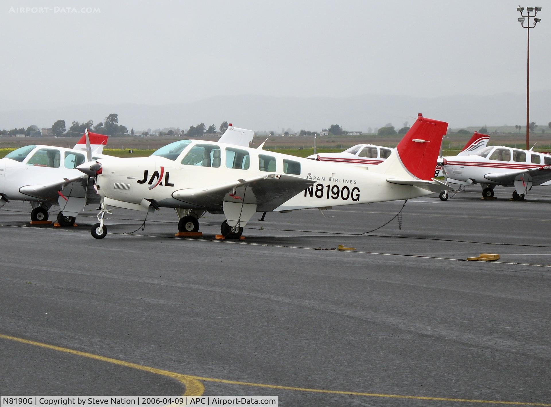 N8190G, 1991 Beech A36 Bonanza 36 C/N E-2658, 1991 Beech A36 Bonanza @ on rainy Japan AL/IASCO A/S ramp Napa County Airport, CA
