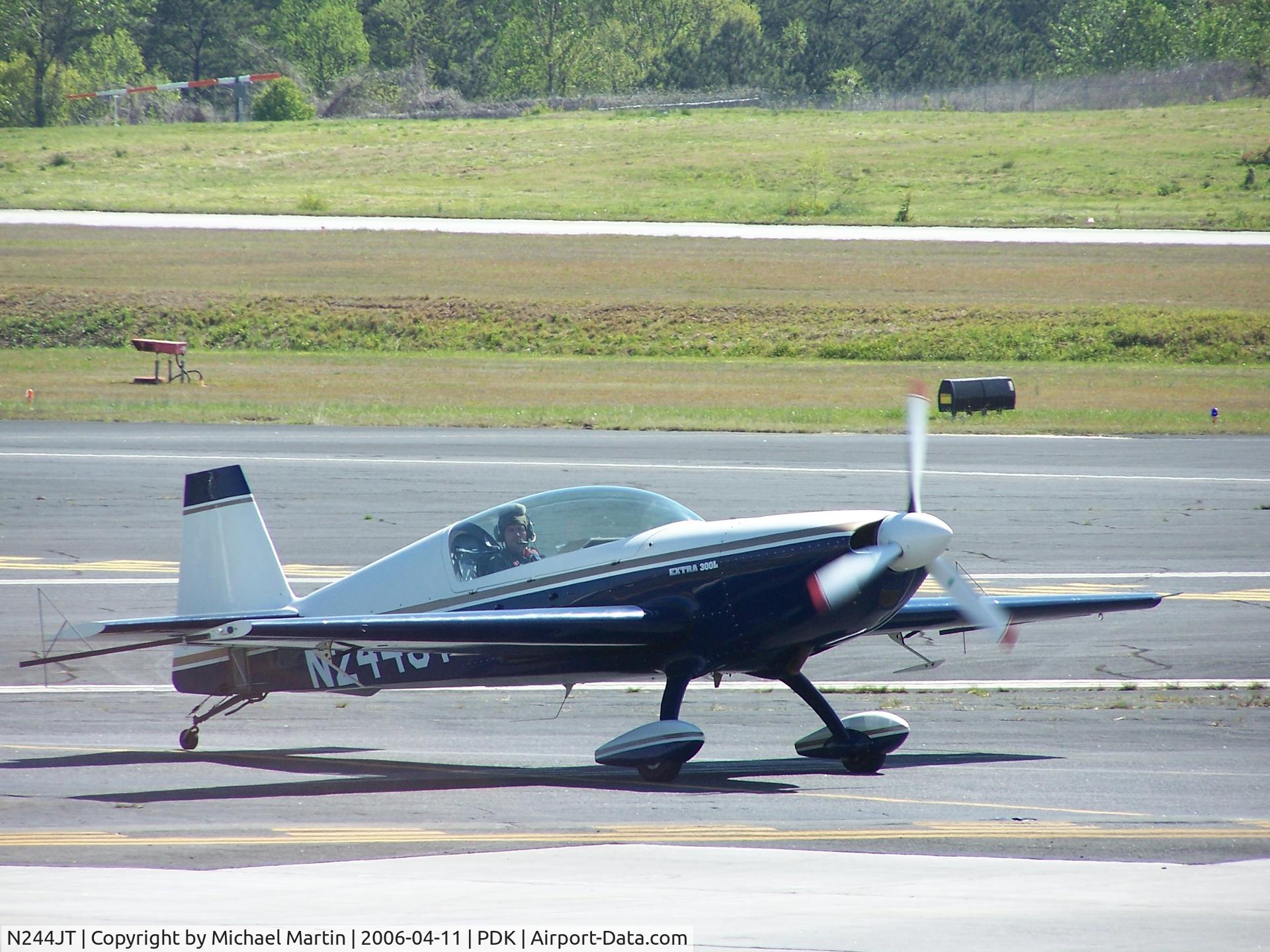 N244JT, Extra EA-300/L C/N 068, Smiling for the camera before taxi
