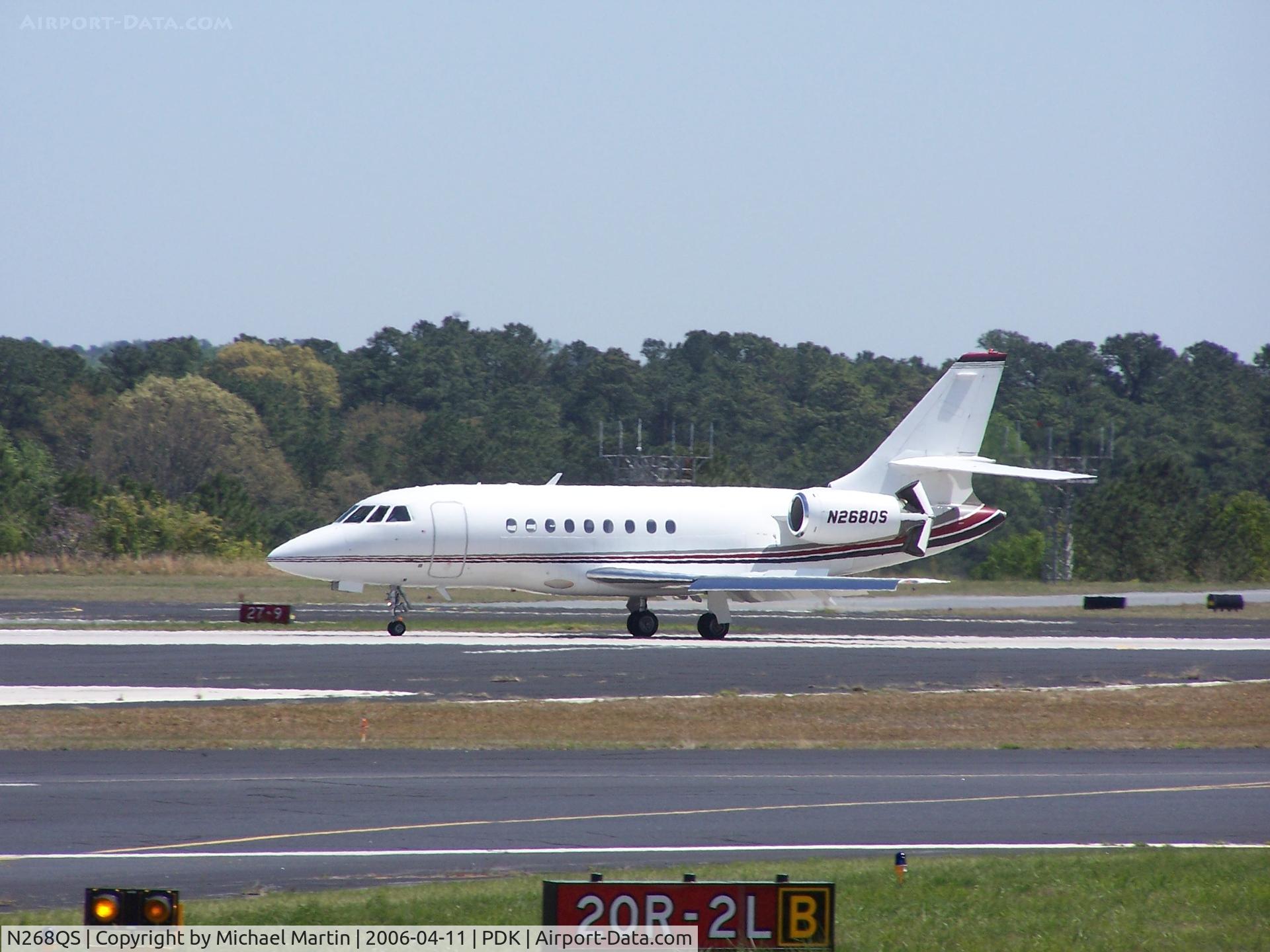 N268QS, 2001 Dassault Falcon 2000 C/N 168, Landing PDK on 20R with airbrakes extended