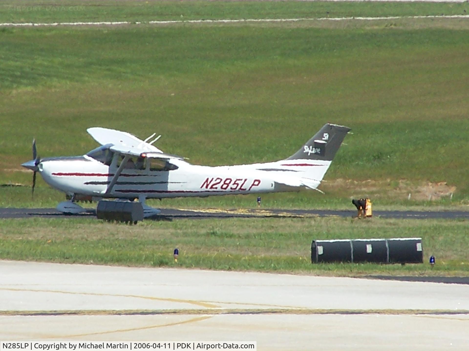 N285LP, 2003 Cessna 182T Skylane C/N 18281285, Student Pilot blew tire on landing.  Waiting for tug!