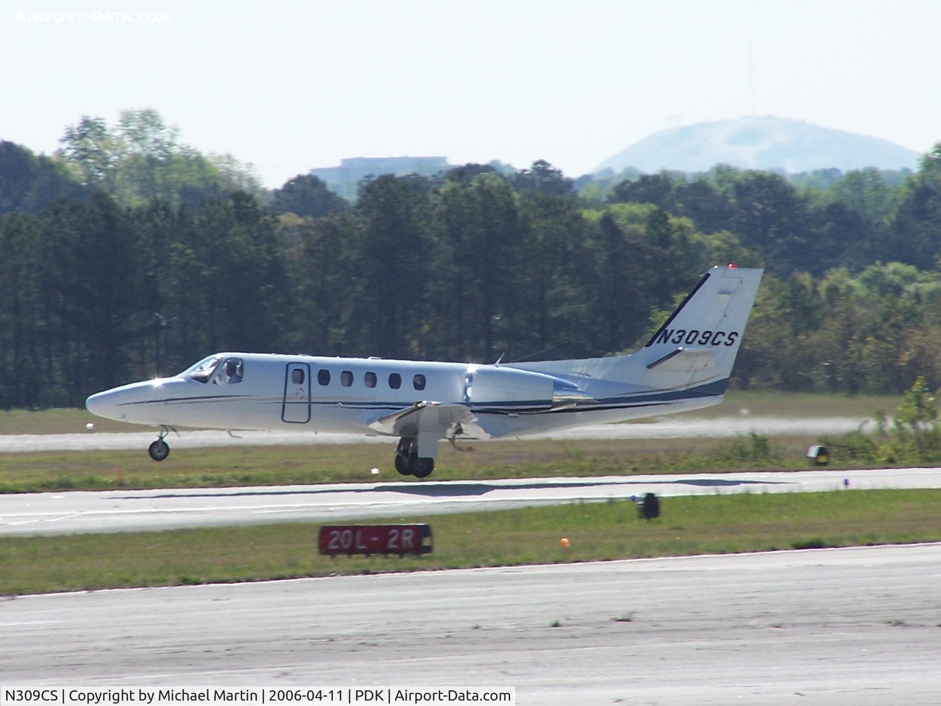 N309CS, 2001 Cessna 550 C/N 550-0977, Just inches from touching down 2R