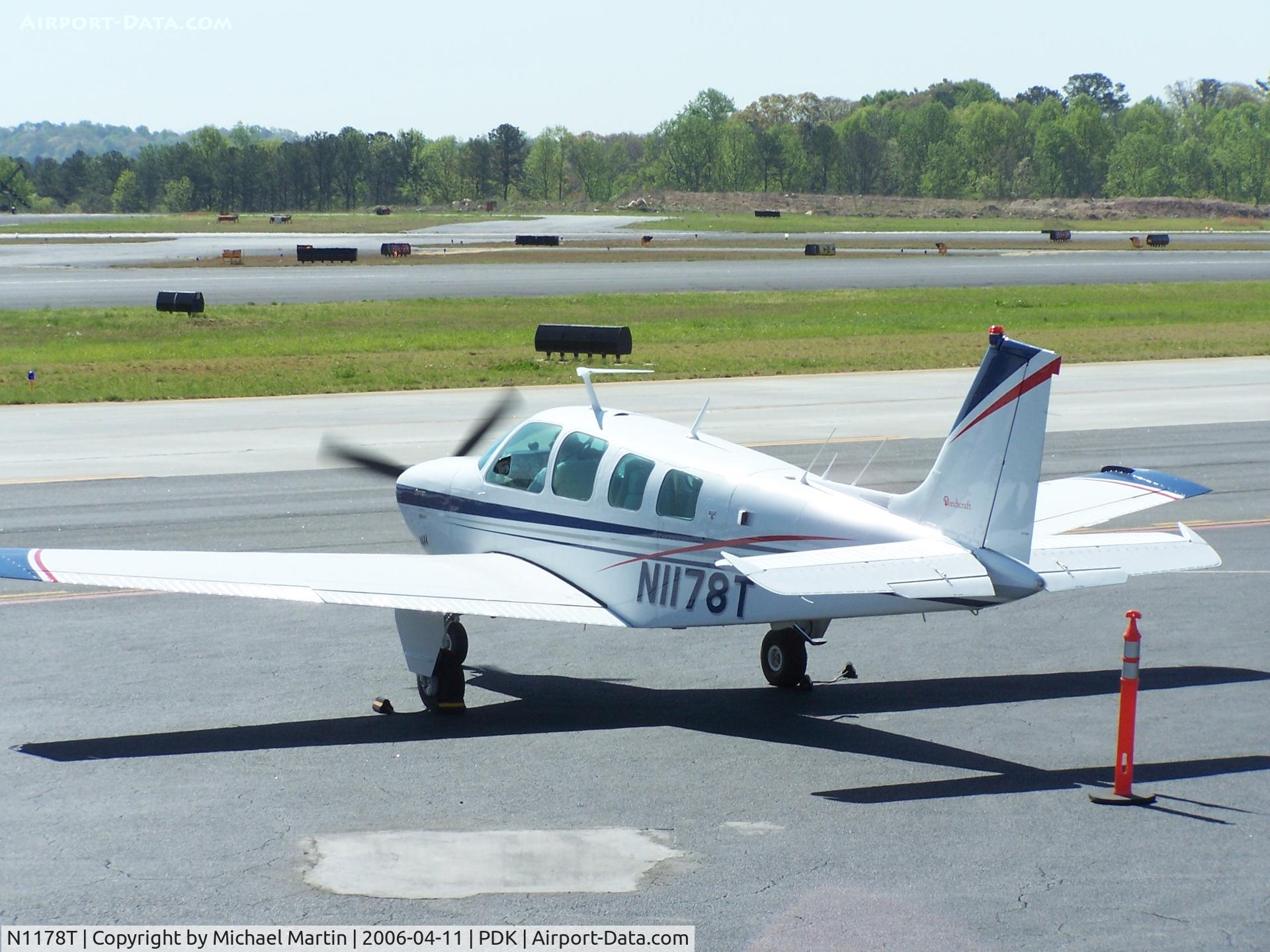 N1178T, 1975 Beech A36 Bonanza 36 C/N E-794, Preparing to depart Mercury Air Service