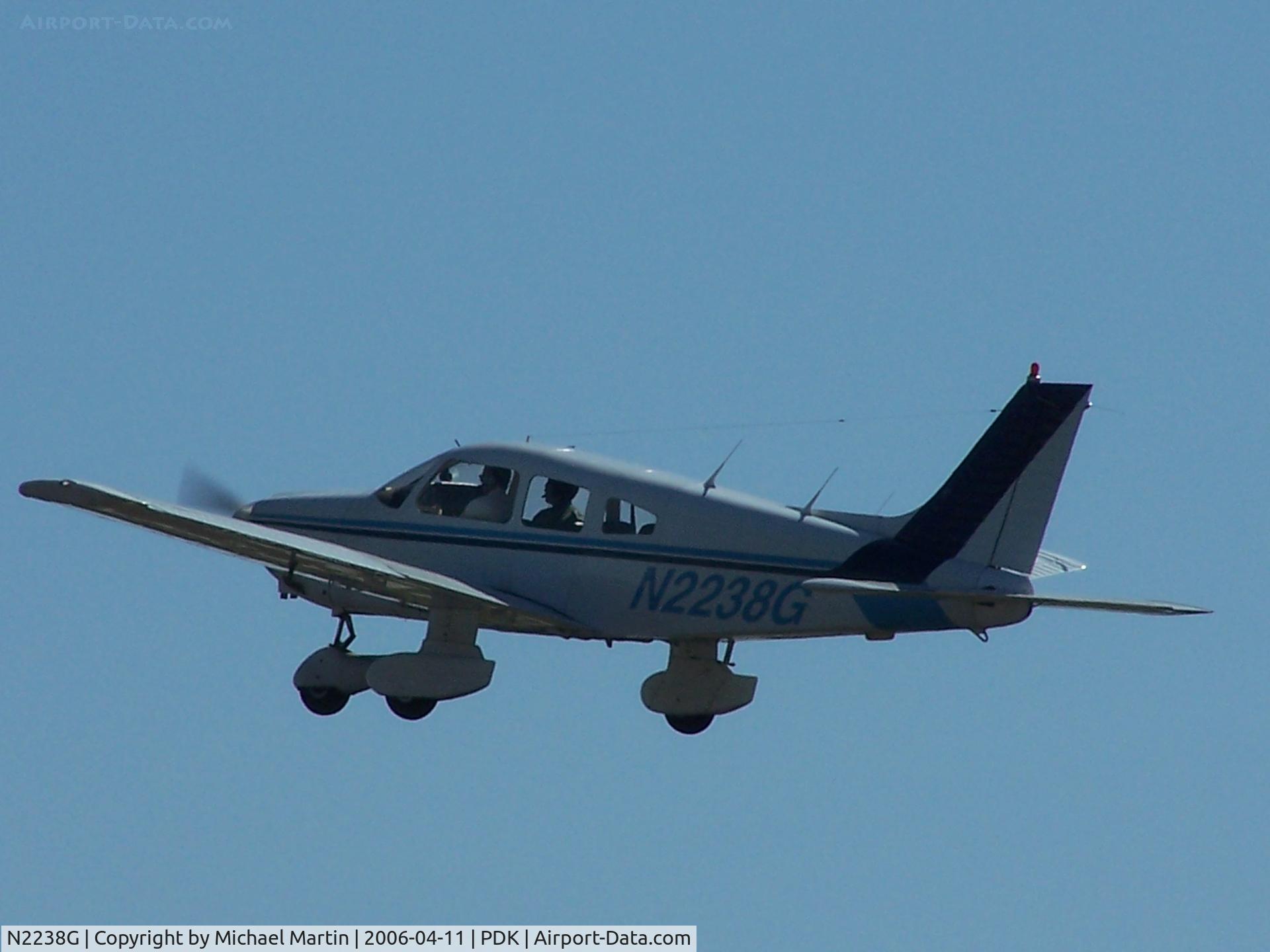 N2238G, 1979 Piper PA-28-181 C/N 28-7990418, Departing PDK