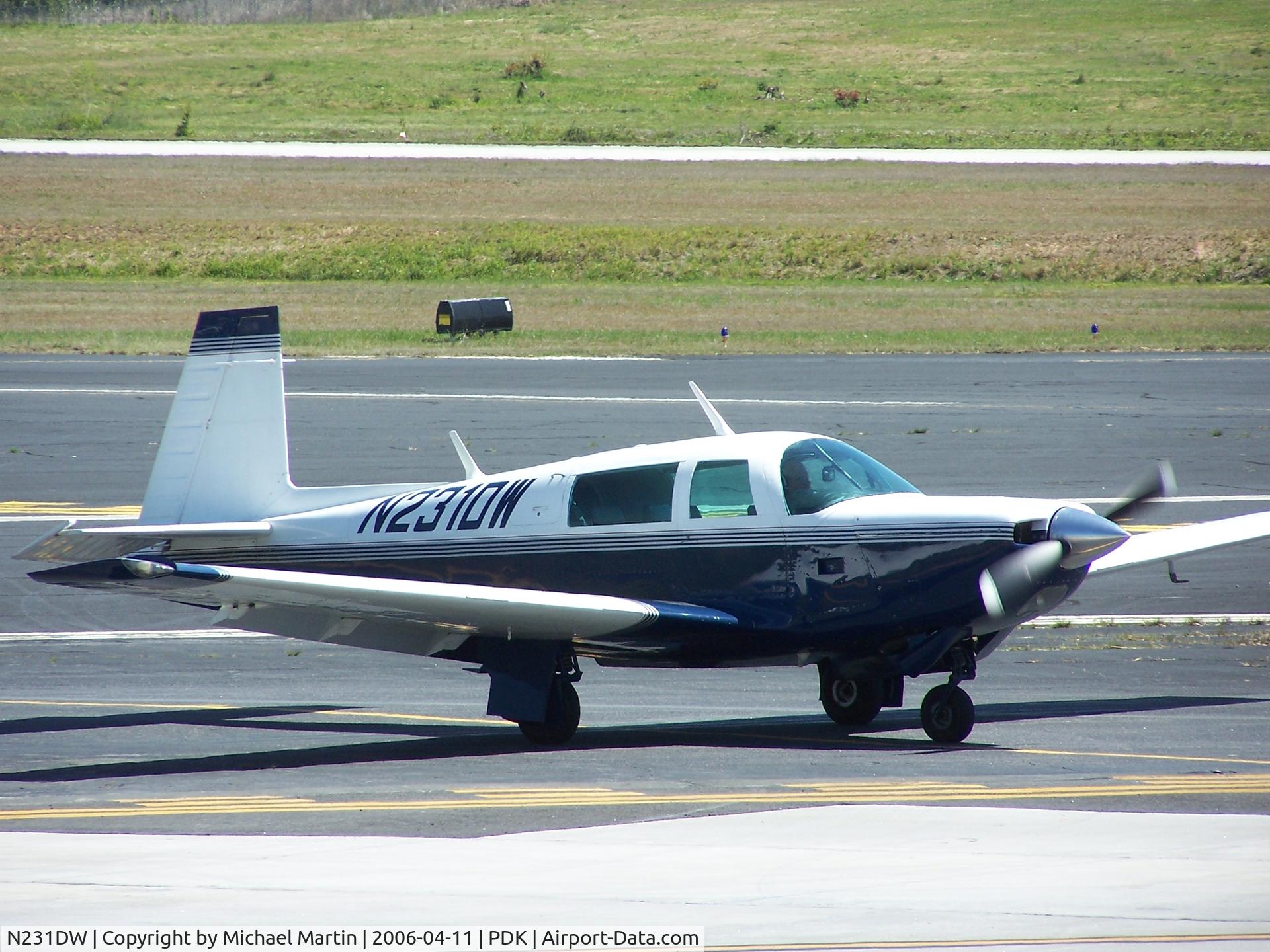 N231DW, 1979 Mooney M20K C/N 25-0144, Taxing to Runway 2L
