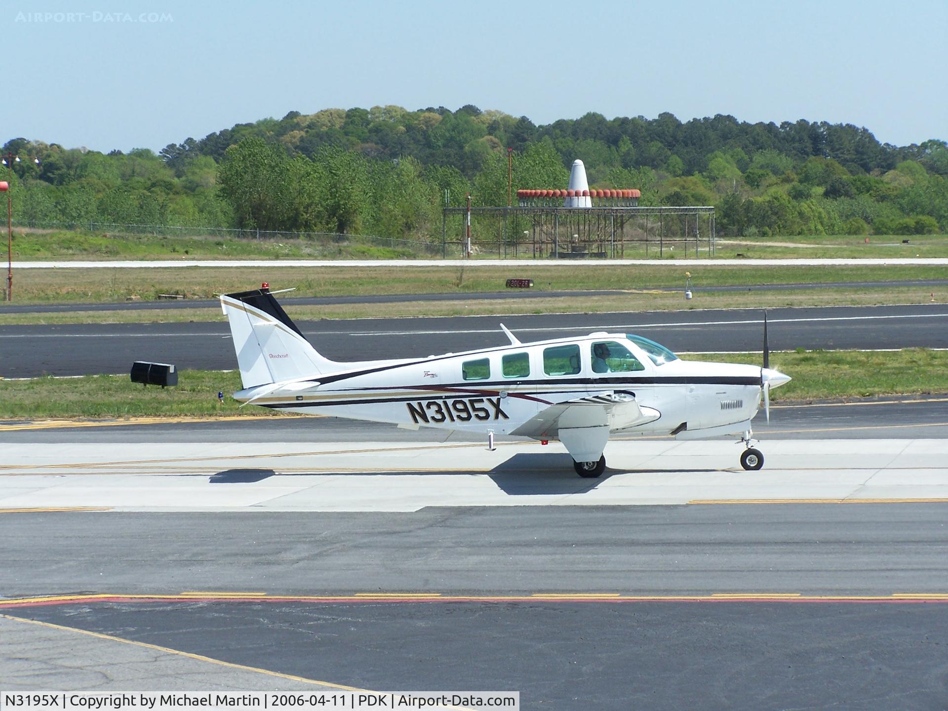 N3195X, 1999 Raytheon Aircraft Company A36 Bonanza C/N E-3295, Taxing to Runway 2L