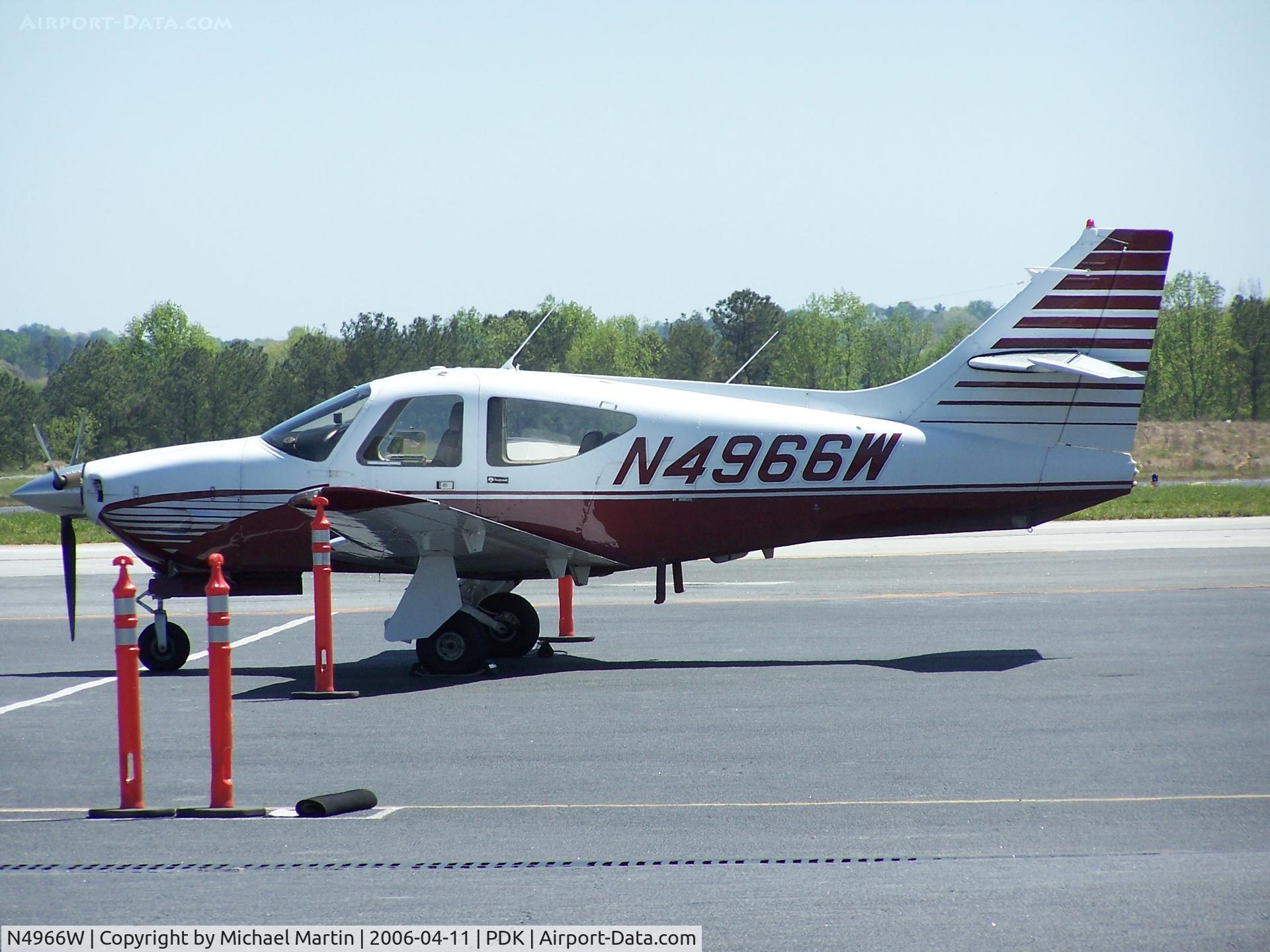N4966W, 1977 Rockwell International 114 Commander C/N 14286, Tied down @ Mercury Air Center