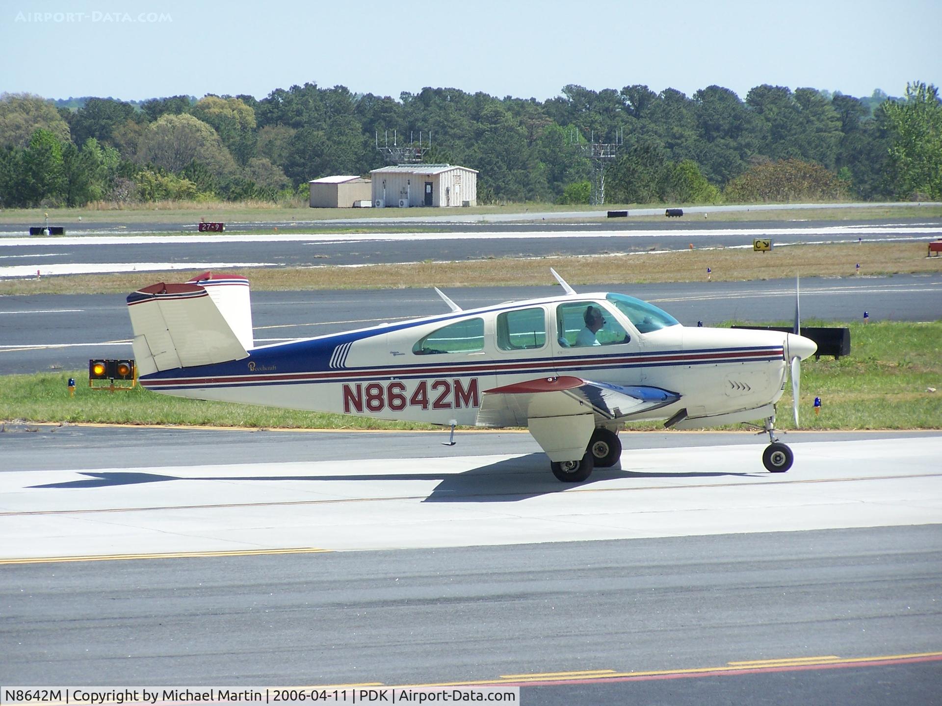 N8642M, 1963 Beech P35 Bonanza C/N D-7251, Taxing to Runway 2L