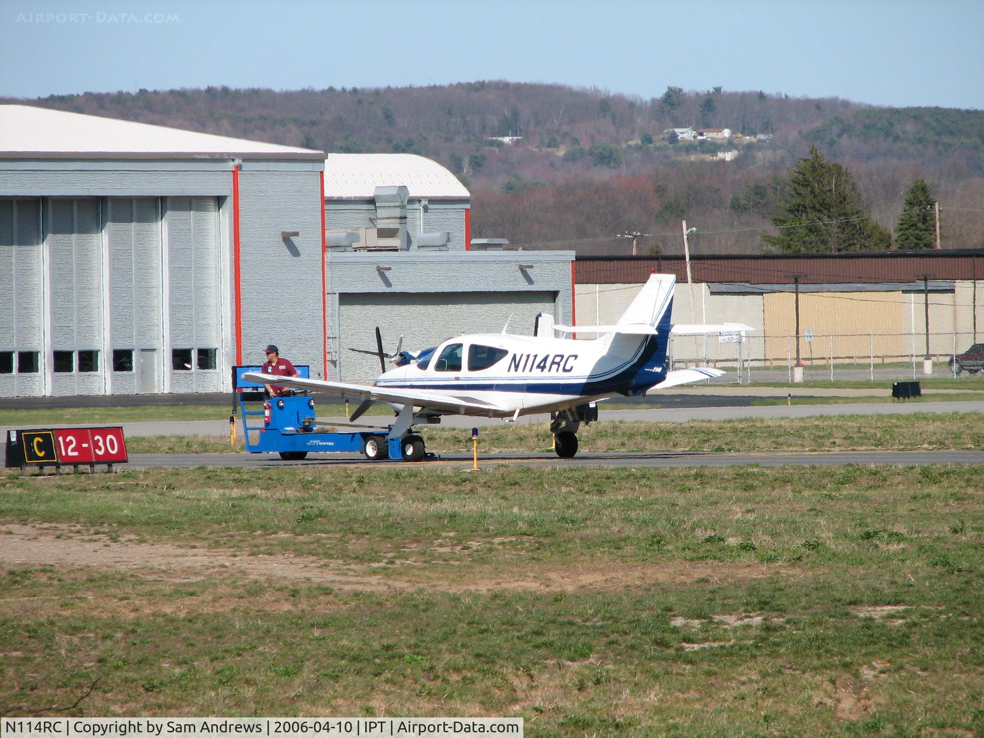 N114RC, 1976 Rockwell International 114 Commander C/N 14011, I have no idea what is going on here.  Heard the pilot come in while I was on my way to the airport on the radio.  I got to the airport and saw the lineman come and get the plane.  I apologize to the owner for what appears to be an ignominious picture.