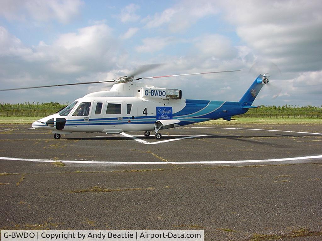 G-BWDO, 1989 Sikorsky S-76B C/N 760356, G-BWDO at Finmere for British Grand Prix