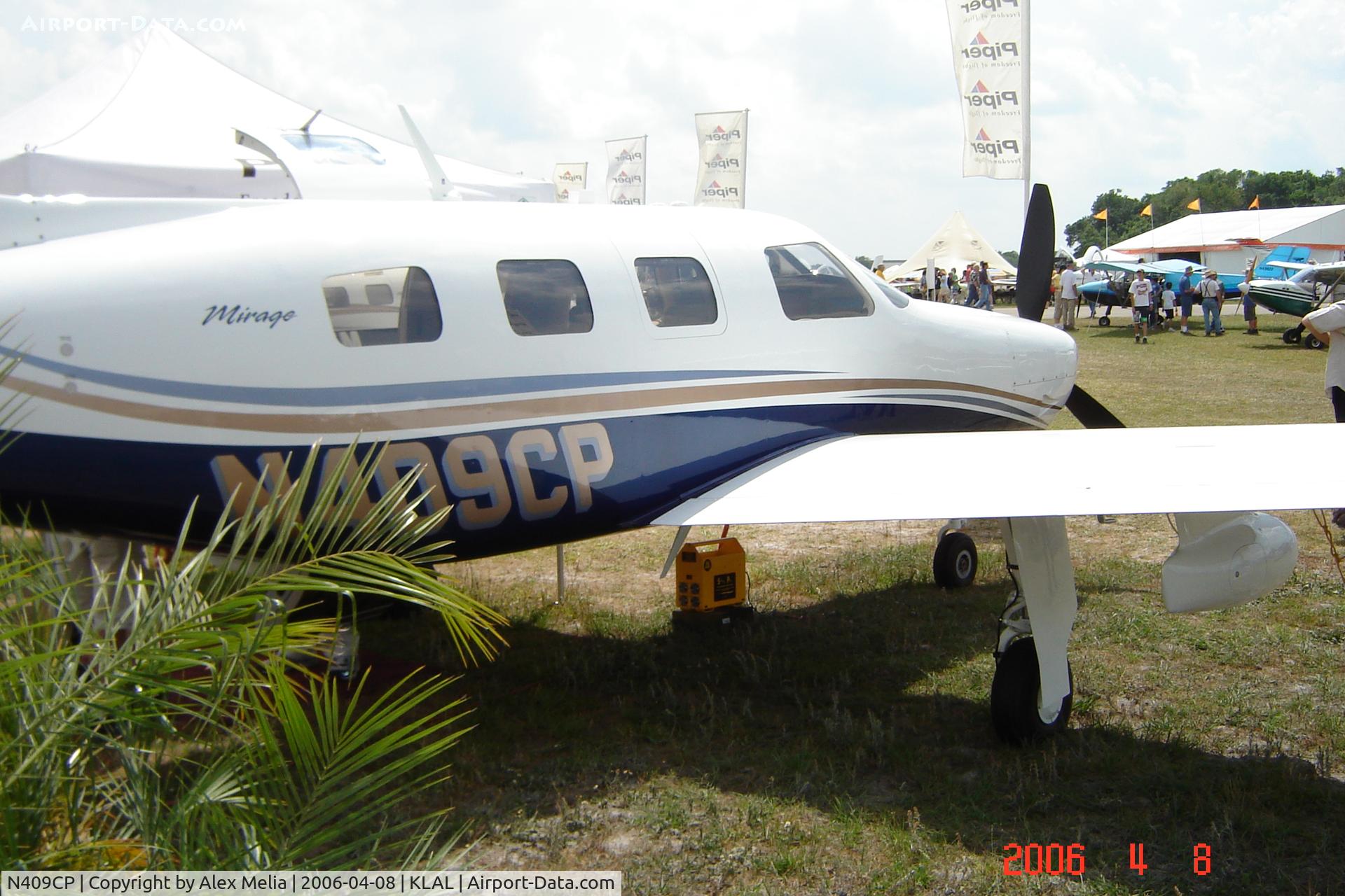 N409CP, 2006 Piper PA-46-350P Malibu Mirage C/N 4636375, A Piper Malibu Mirage at the '06 Sun 'N Fun in Lakeland, Fla.