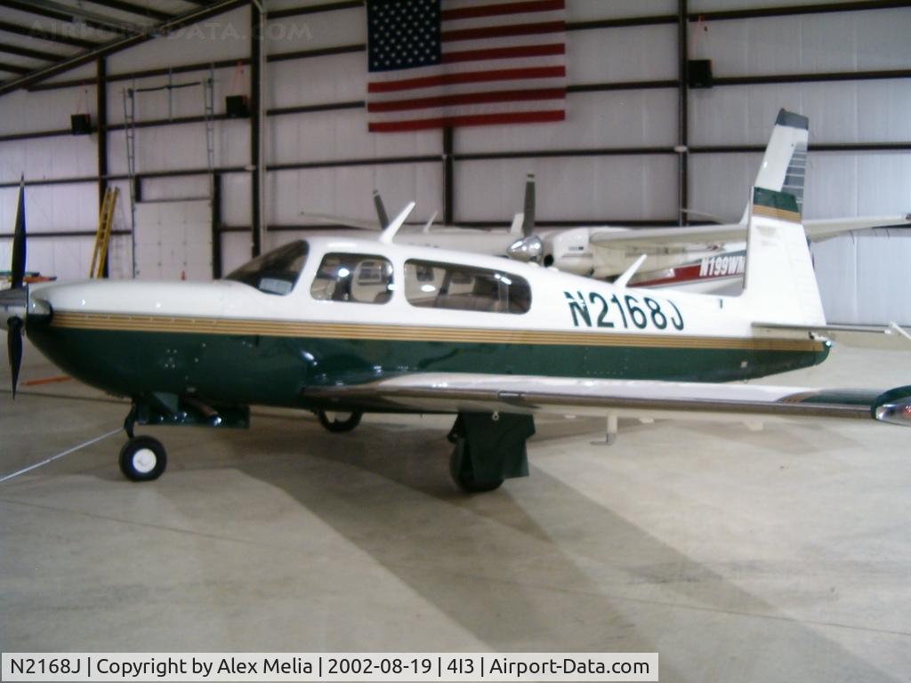 N2168J, 1999 Mooney M20M Bravo C/N 27-0265, Port side of the M20M Bravo in its storage hangar