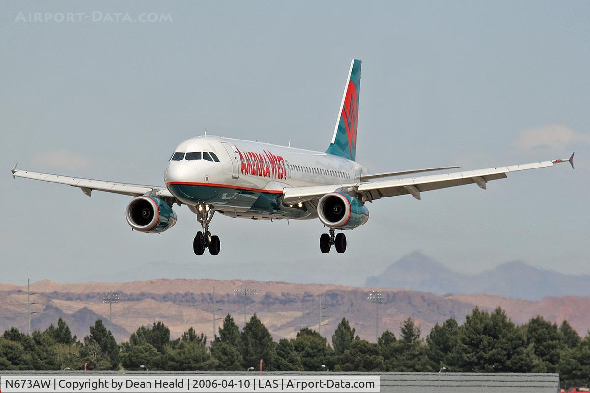 N673AW, 2004 Airbus A320-232 C/N 2312, America West FLT AWE64 on short-final to RWY 25L after a 42-minute flight from Phoenix Sky Harbor Int'l (KPHX) - Phoenix, Arizona.
