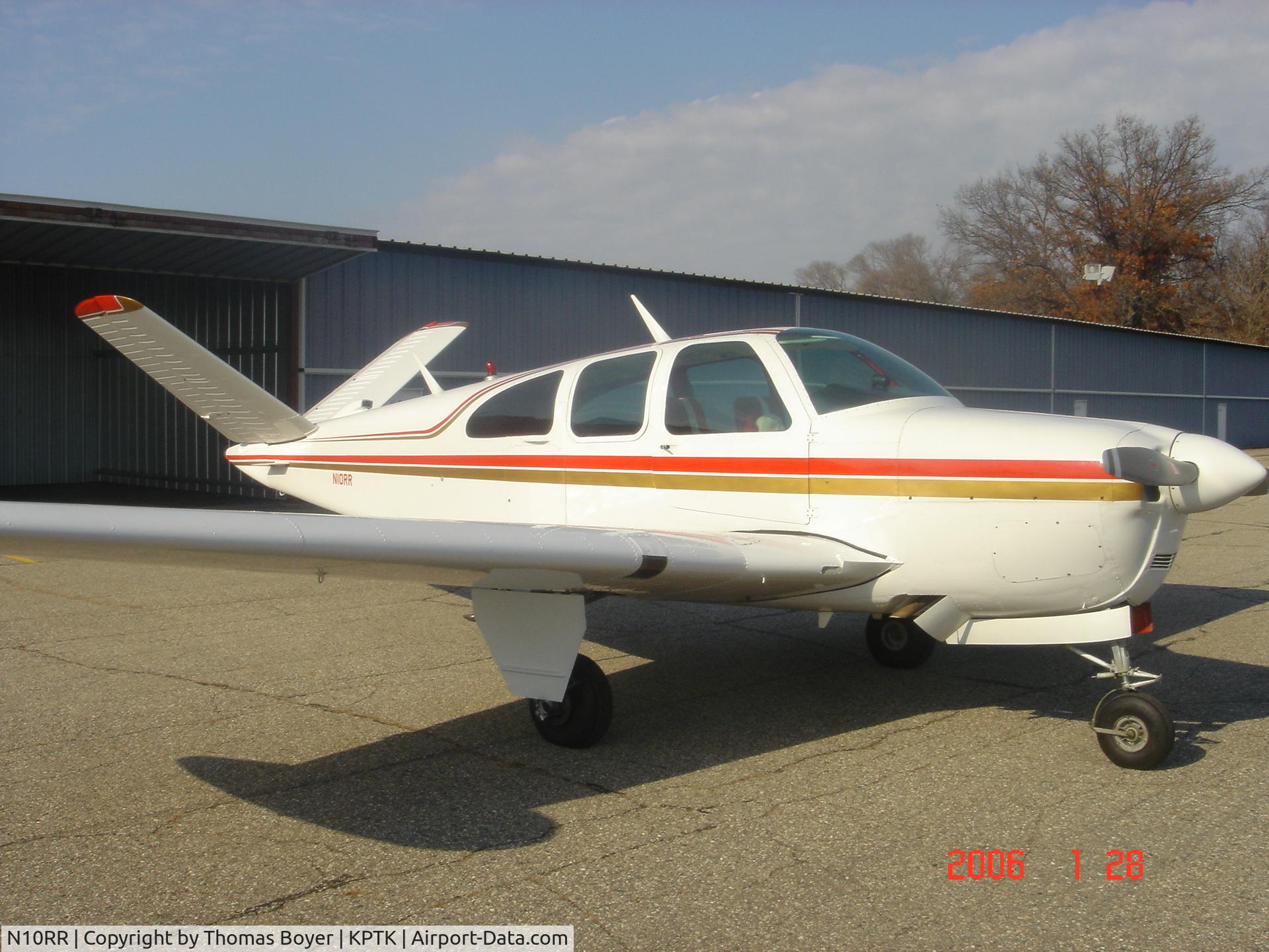 N10RR, 1954 Beech E35 C/N D-3706, N10RR in front of hangar at KPTK