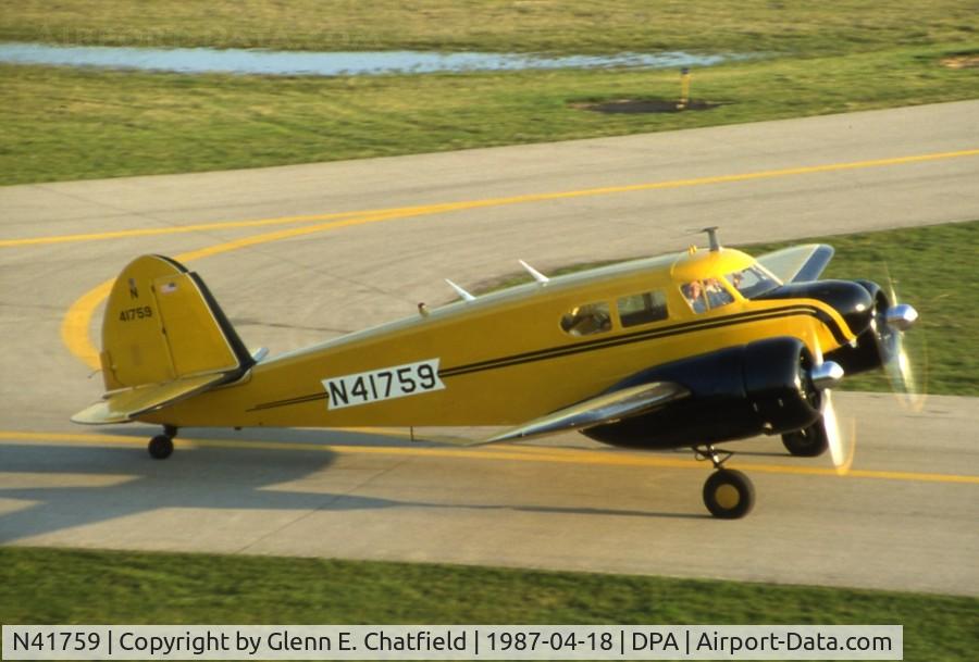 N41759, 1944 Cessna UC-78 (T-50) Bobcat C/N 5807, Taxiing by the control tower, this is UC-78B 43-31869, at the time owned by Rich Peterson and his dad at DuPage Airport