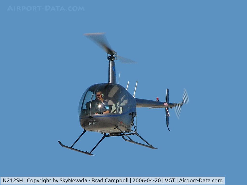 N212SH, 2005 Robinson R22 BETA C/N 3995, Owned by Robinson Helicopter Co. / 2005 Robinson Helicopter R22 BETA / Perhaps that is Mrs. Robinson in the driver's seat?