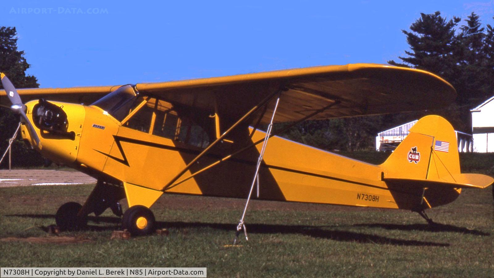 N7308H, 1946 Piper J3C-65 Cub C/N 20569, A classic aircraft in a classic scheme shows off her plumage at a local airshow.