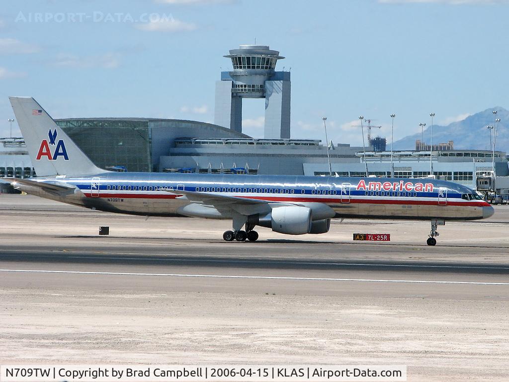 N709TW, 1997 Boeing 757-2Q8 C/N 28168, American Airlines / 1997 Boeing 757-2Q8 / McCarran ATCT in background