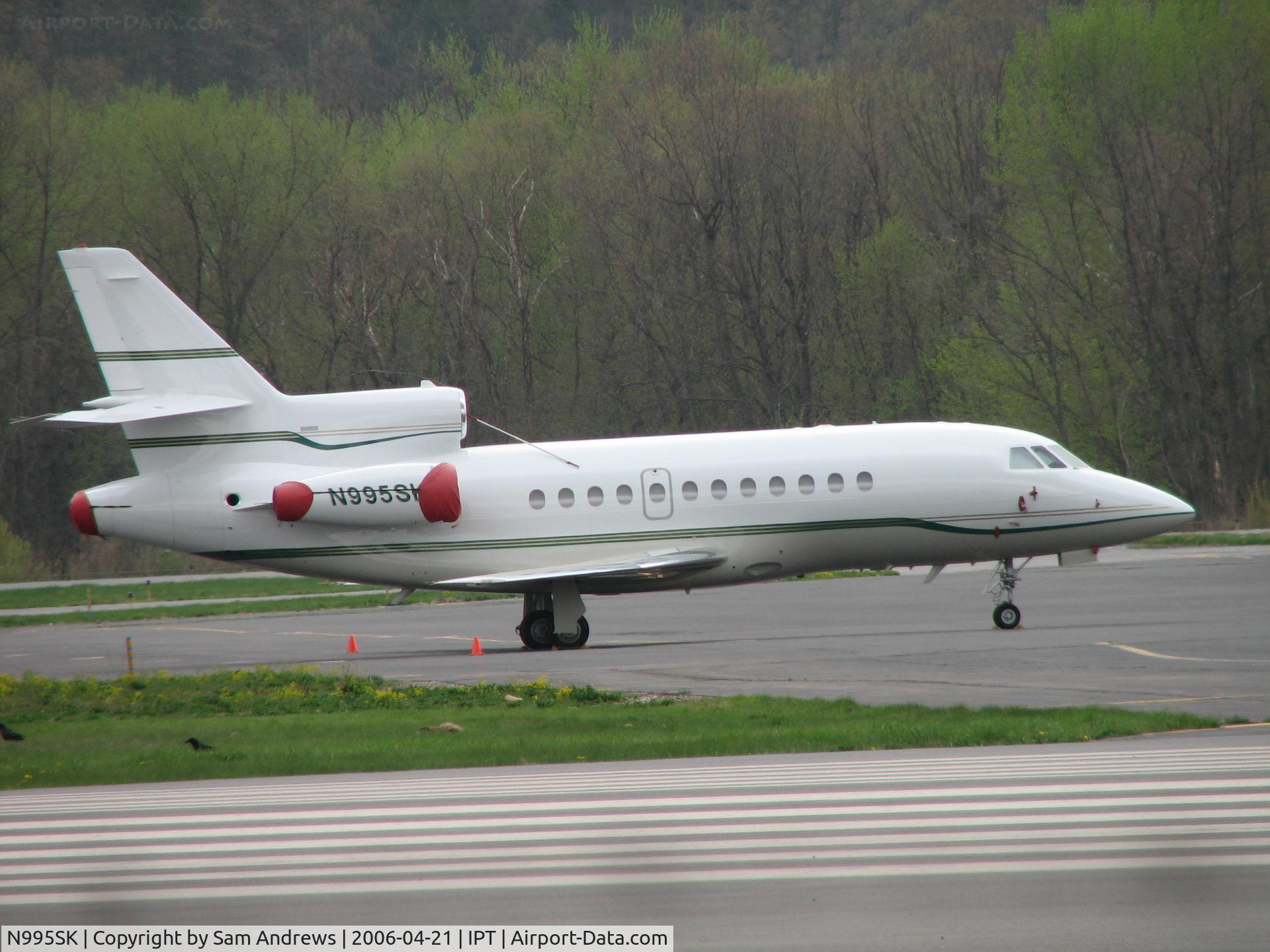 N995SK, 1997 Dassault Falcon 900 C/N 166, Sitting on the GA Ramp at IPT.  Owned by TIBURON TRANSPORTATION LTD of Santa Rosa CA