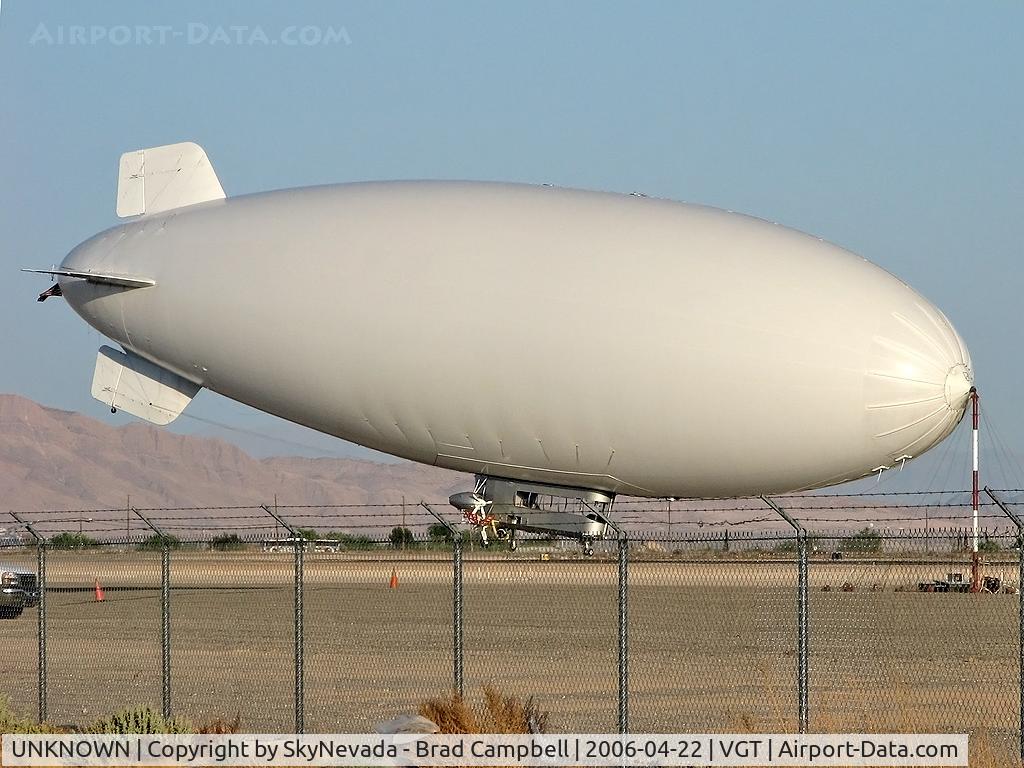 UNKNOWN, Various Airships C/N unknown, I don't know the tail number because it doesn't have one yet! It's brand new and parked at VGT. No markings whatsoever and a big black cloth hanging on the other side cover something up.