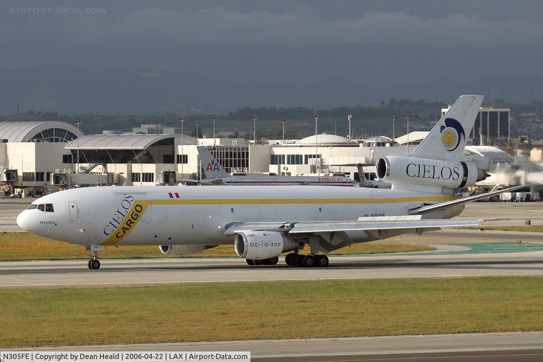 N305FE, 1980 Douglas DC-10-30F C/N 47870, Cielos DC-10-30F rolling out after arriving on RWY 25L.  This particular plane used the entire length of the runway, whereas most cargo aircraft use 1/2-to-3/4 of the the length. The thrust reversers for the wing engines were never used.