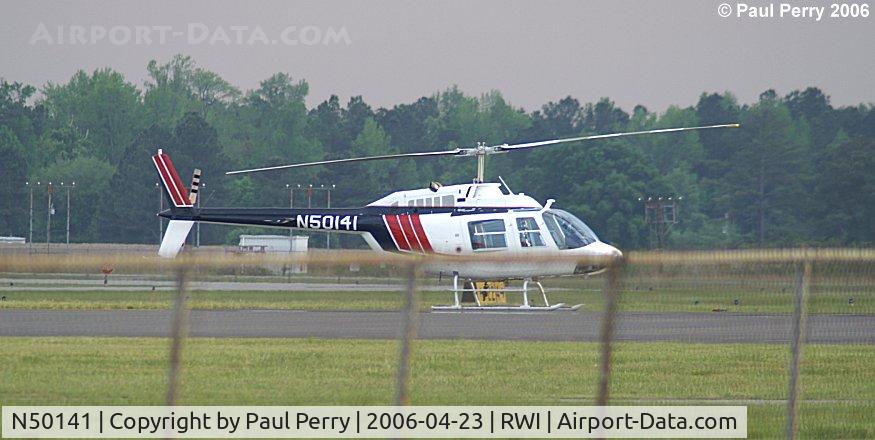 N50141, 1979 Bell 206B-III C/N 2603, Fine study of a Bell, even with the fence.