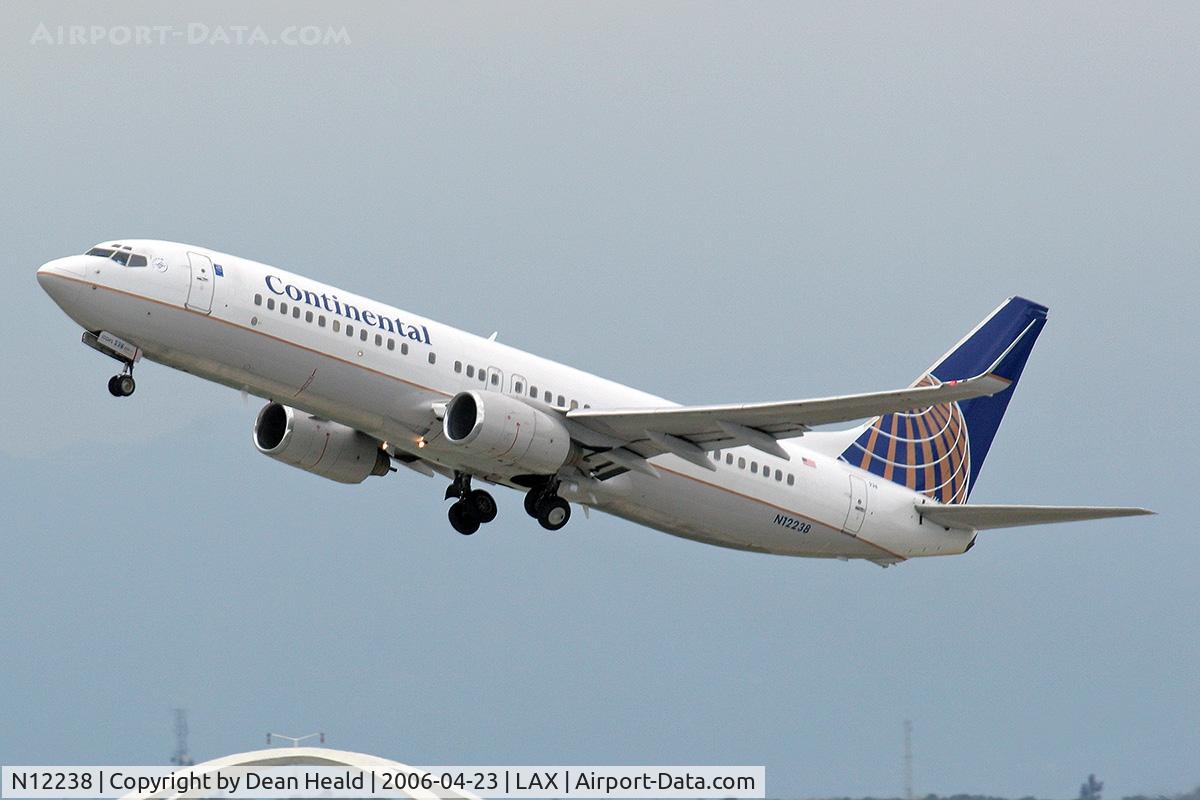 N12238, 1999 Boeing 737-824 C/N 28804, Continental N12238 (FLT COA1503) departing RWY 25R enroute to Newark/New York Liberty Int'l (KEWR). Dave Budd's girlfriend is a First Class flight attendant on this flight.