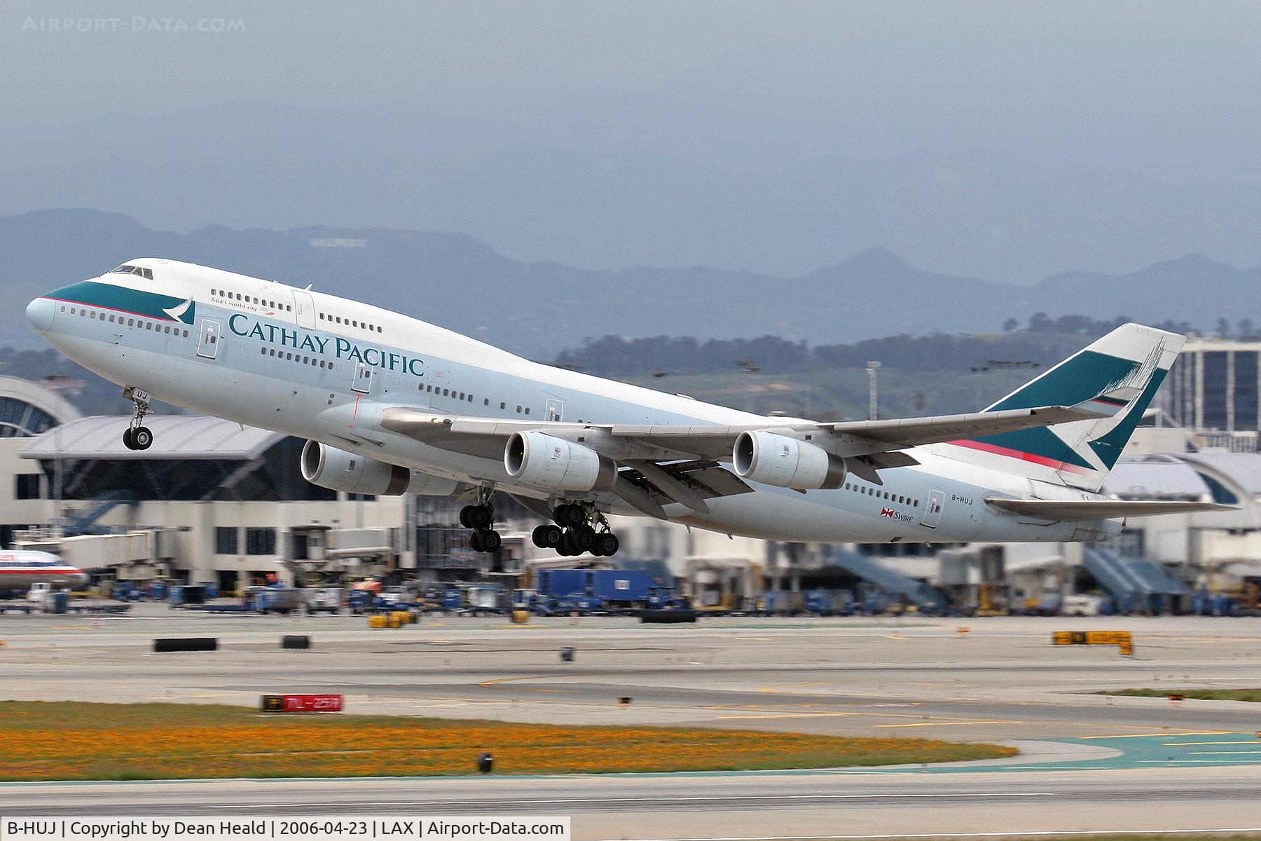 B-HUJ, 1995 Boeing 747-467 C/N 27595, Cathay Pacific B-HUJ departing LAX RWY 25R.