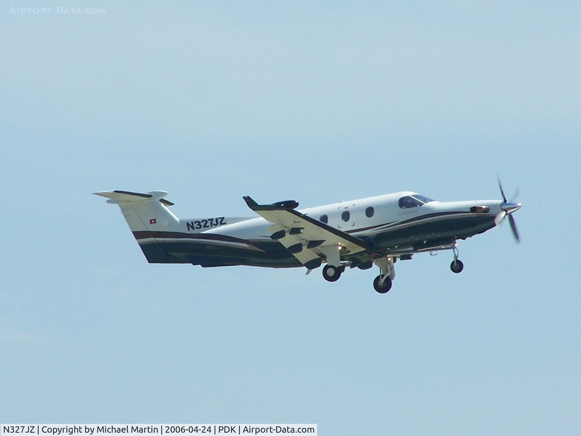 N327JZ, 2000 Pilatus PC-12/45 C/N 327, Departing PDK - Gear Up!