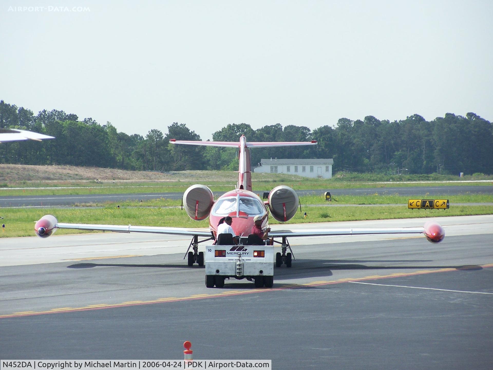 N452DA, 1981 Gates Learjet Corp. 35A C/N 35A-452, Being towed to parking at Mercury Air Center