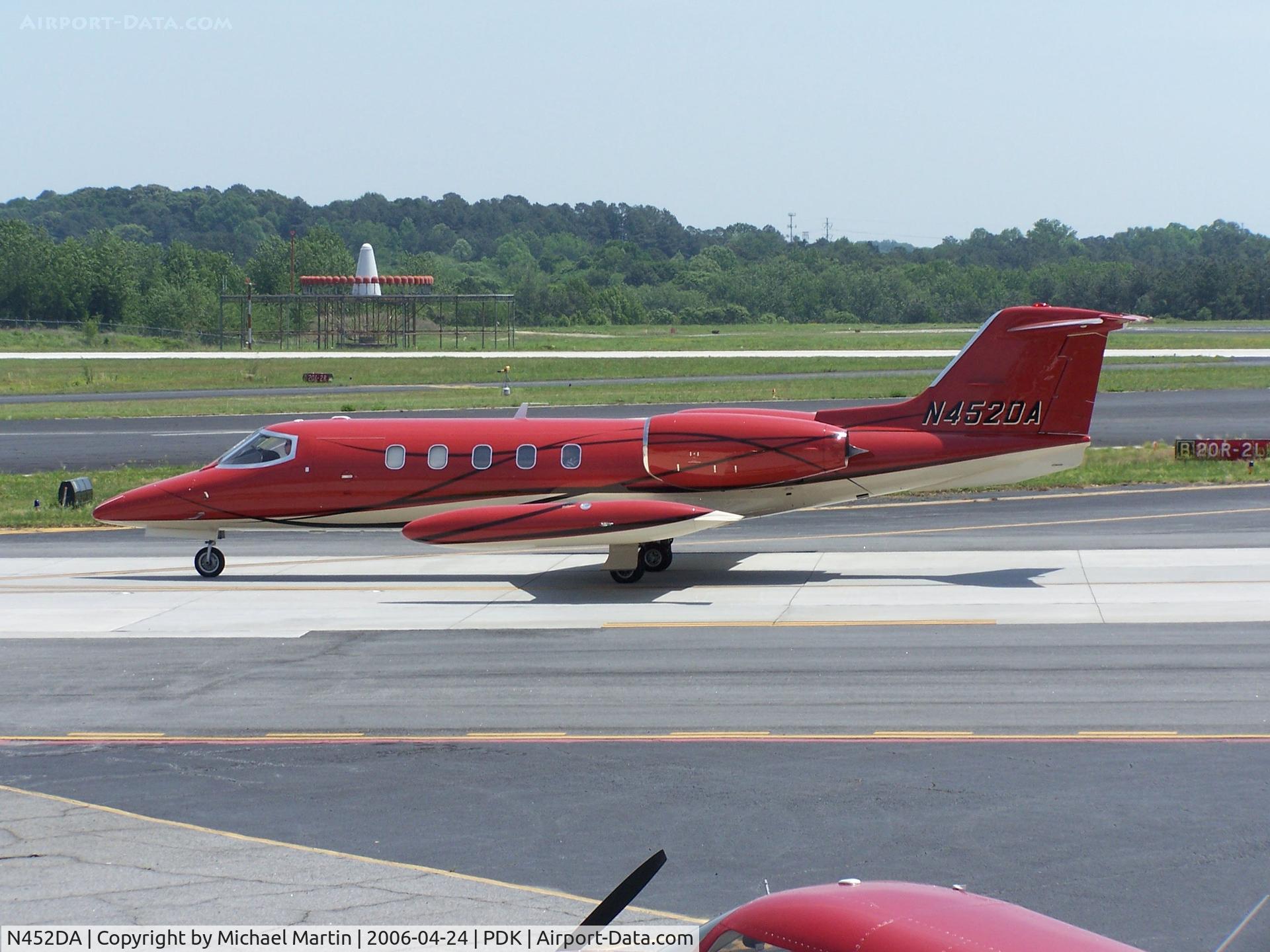 N452DA, 1981 Gates Learjet Corp. 35A C/N 35A-452, Taxing to 20L - Nice Stripes