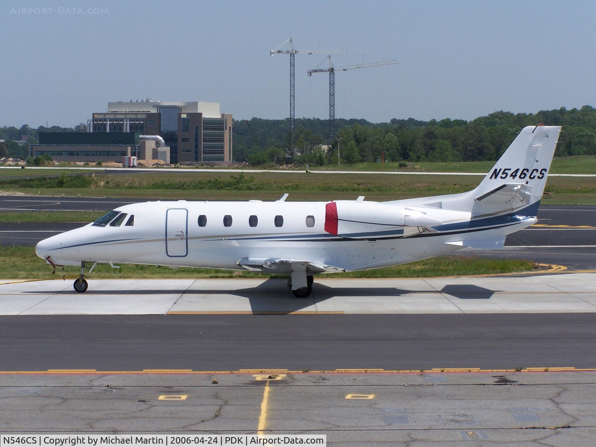 N546CS, Cessna 560XL C/N 560-5524, Being towed to parking at Epps Air Service