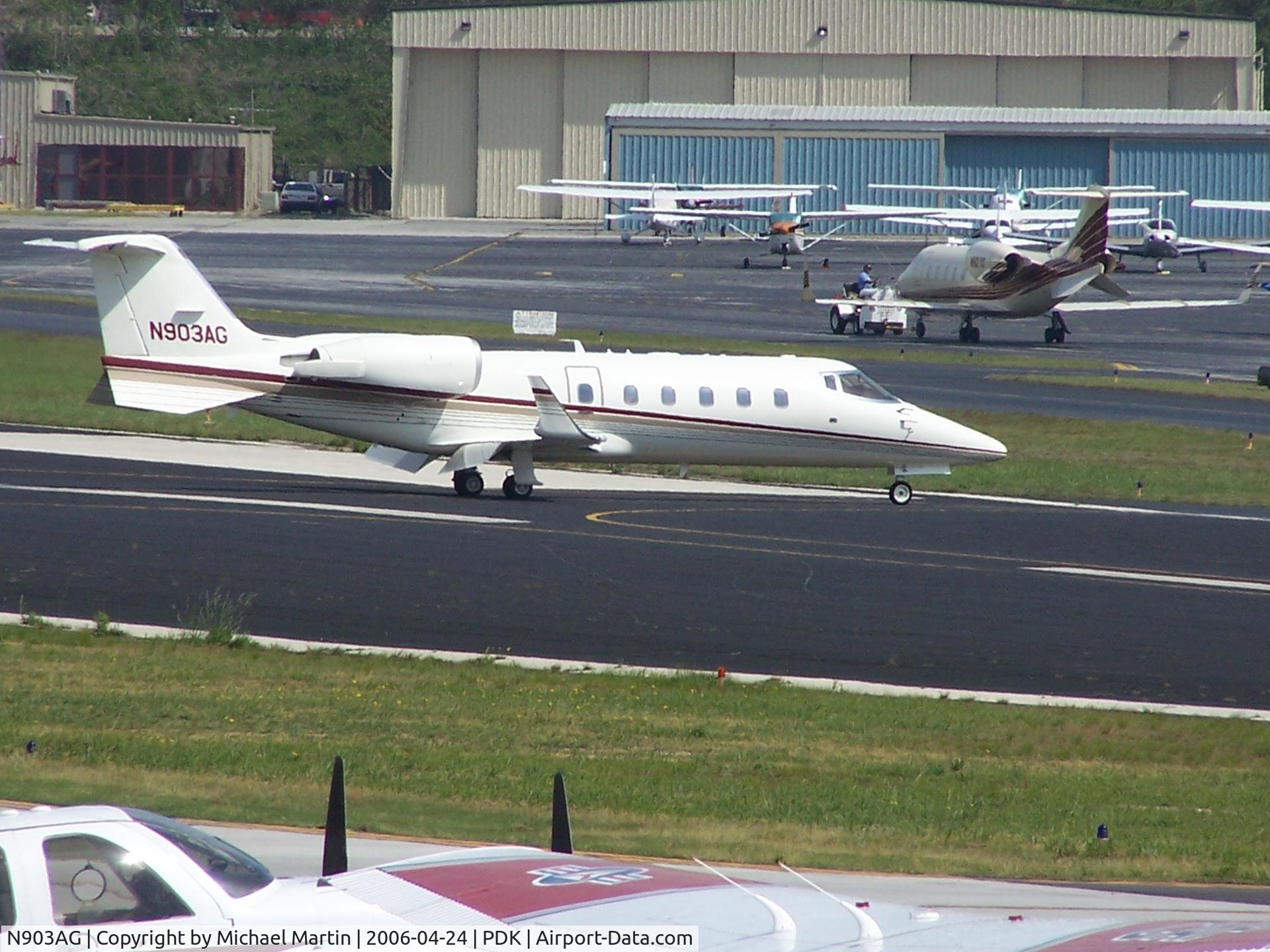 N903AG, 1994 Learjet 60 C/N 60-045, TAXING TO 20L