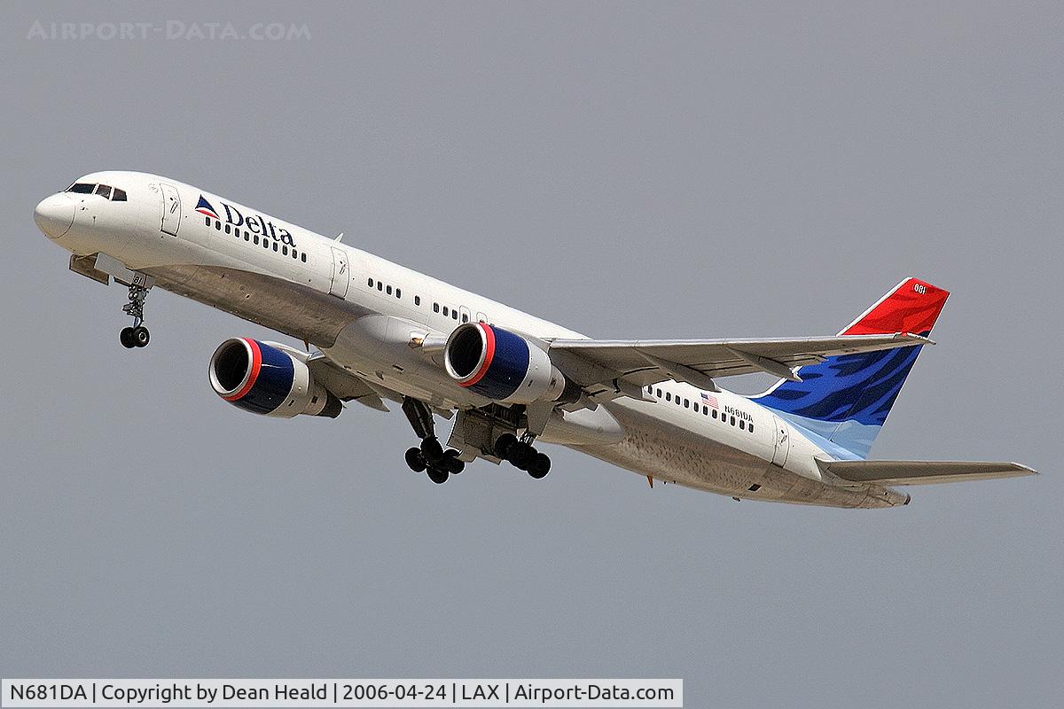 N681DA, 1993 Boeing 757-232 C/N 26957, Delta Airlines N681DA (FLT DAL1623) retracting the landing gear while climbing out from RWY 25R enroute to Cincinnati Northern Kentucky Int'l (KCVG) - Cincinnati, Ohio.