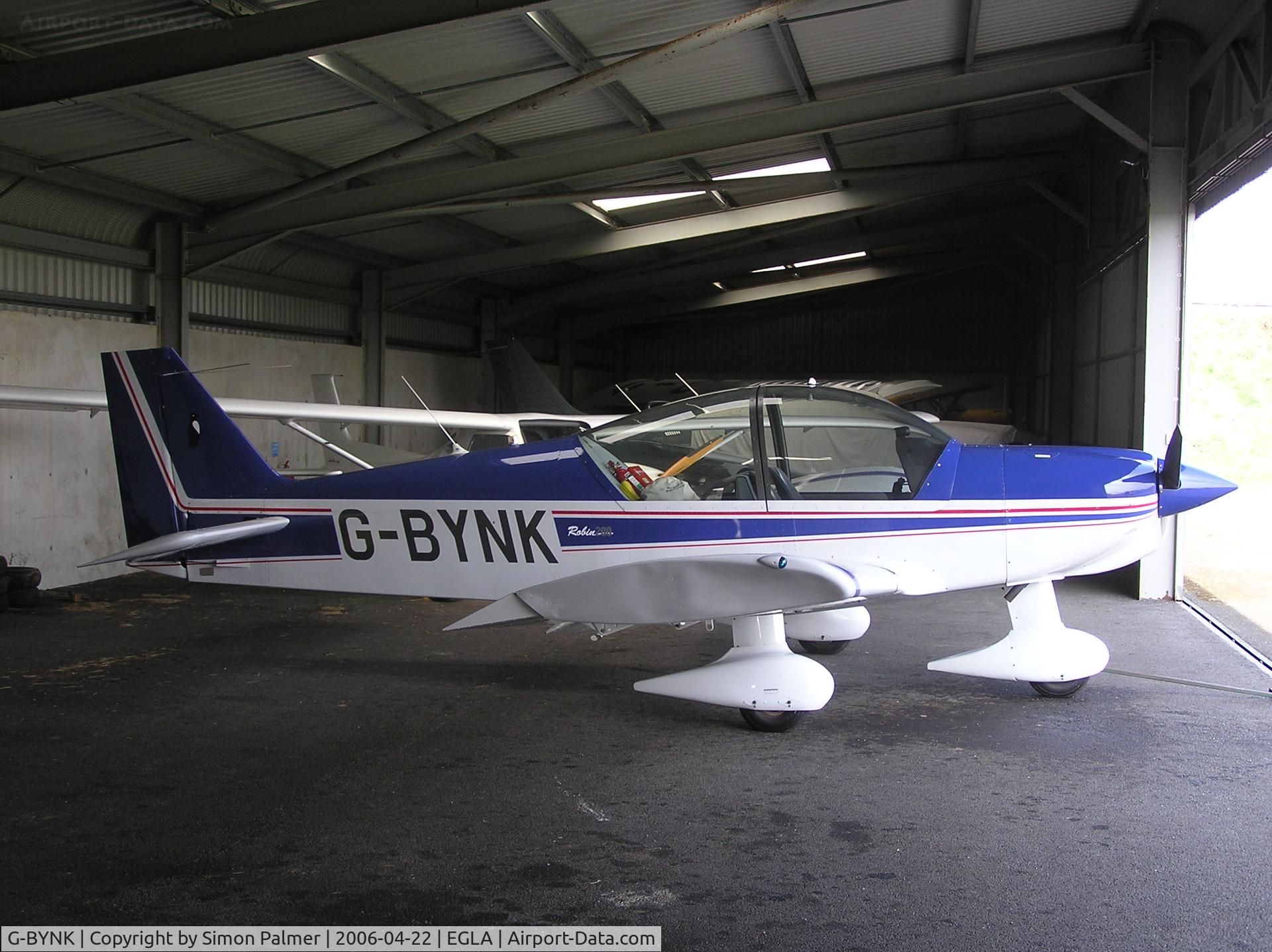 G-BYNK, 1999 Robin HR-200-160 C/N 338, Robin HR100 in the hangar at Bodmin
