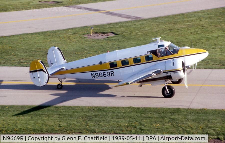 N9669R, 1960 Beech G18S C/N BA-495, Taxiing by the control tower