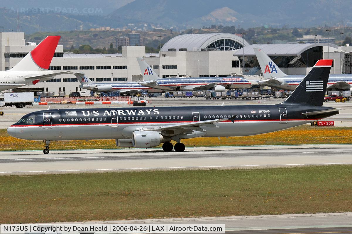 N175US, 1984 British Aerospace BAe.146-200A C/N E2036, US Airways N175US - 2001 Airbus Industrie A321-211 (FLT USA17) turning off of RWY 25L onto taxiway Tango after arrival from Philadelphia Int'l (KPHL), Pennsylvania.